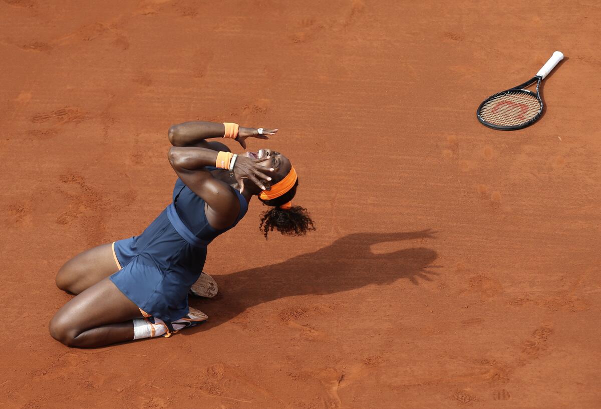 FILE - Serena Williams, of the U.S., celebrates as she defeats Russia's Maria Sharapova during the women's final match of the French Open tennis tournament at Roland Garros stadium Saturday, June 8, 2013 in Paris. Williams won 6-4, 6-4. Serena Saying “the countdown has begun,” 23-time Grand Slam champion Serena Williams announced Tuesday, Aug. 9, 2022, she is ready to step away from tennis so she can turn her focus to having another child and her business interests, presaging the end of a career that transcended sports. (AP Photo/David Vincent, File)