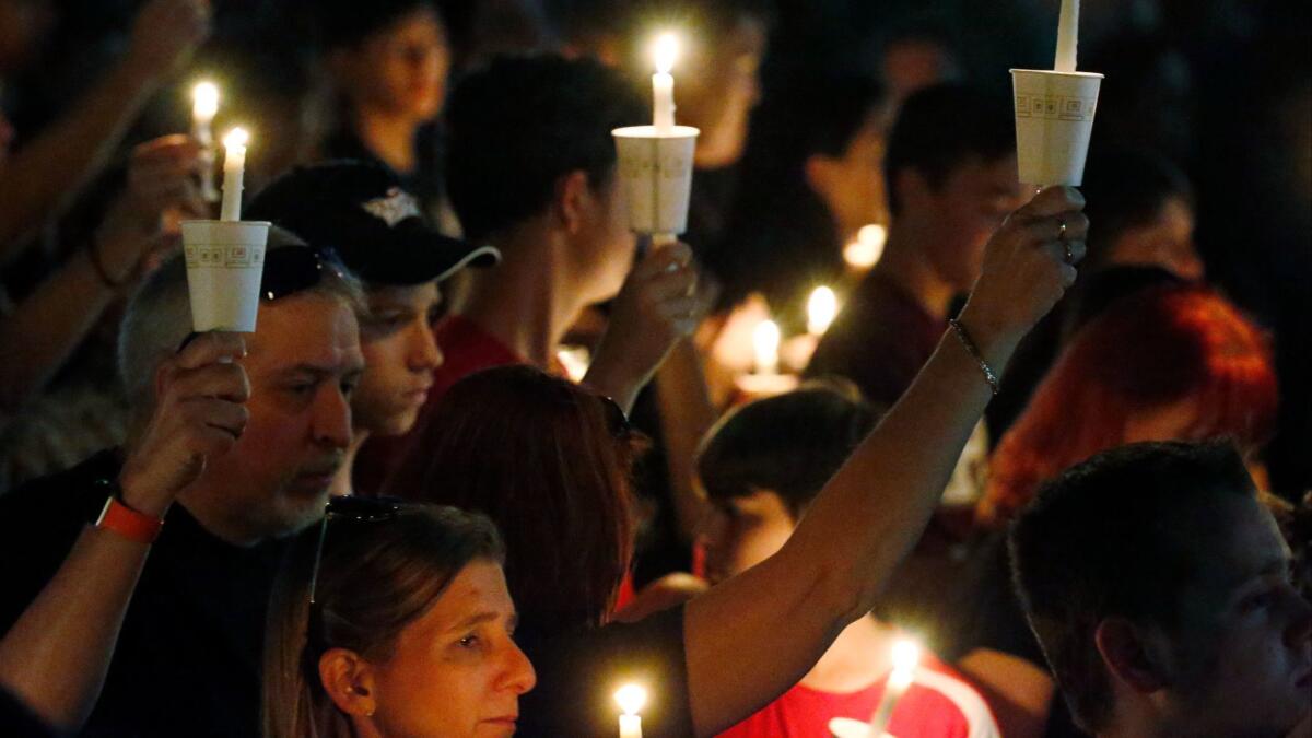 A candlelight vigil for the victims of the shooting at Marjory Stoneman Douglas High School,