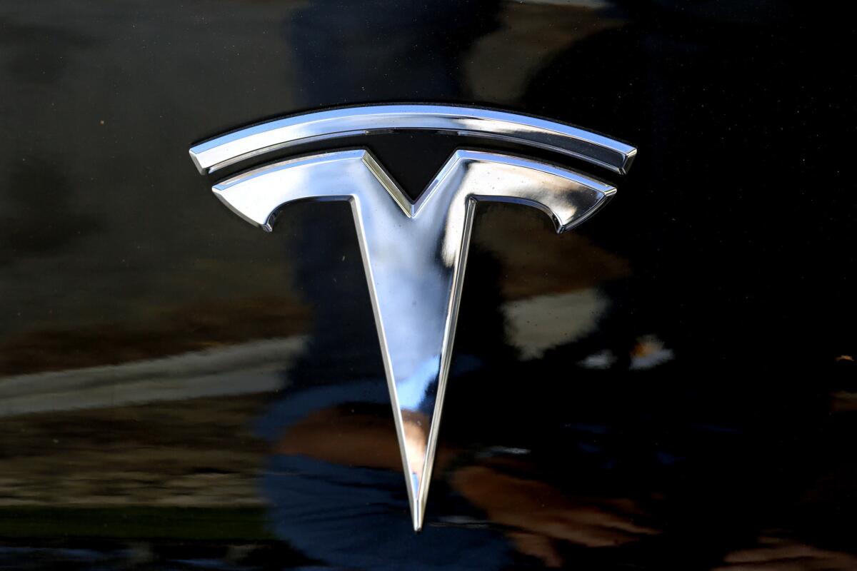 The Tesla logo seen on a car.