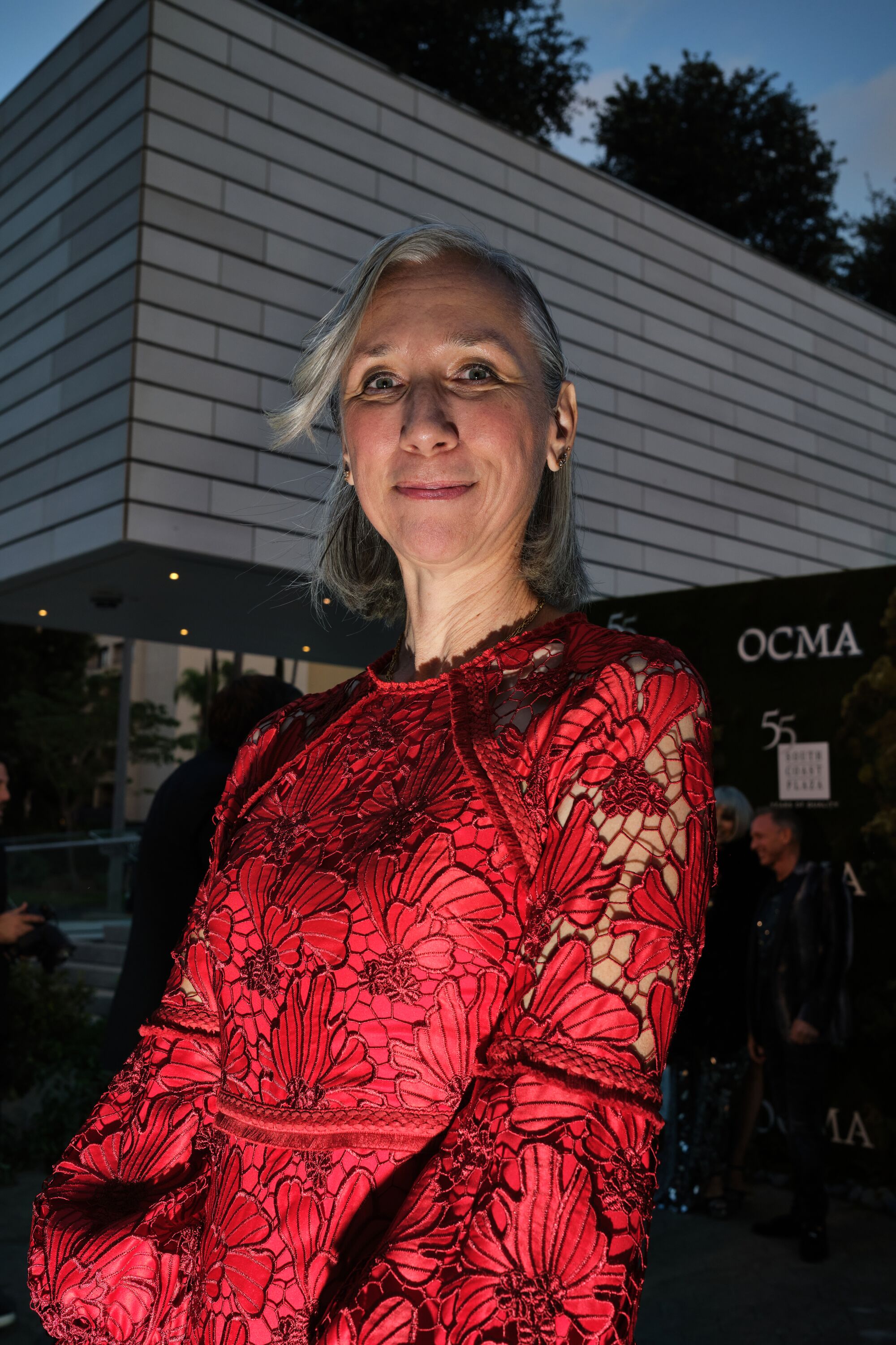 A woman in a red dress.