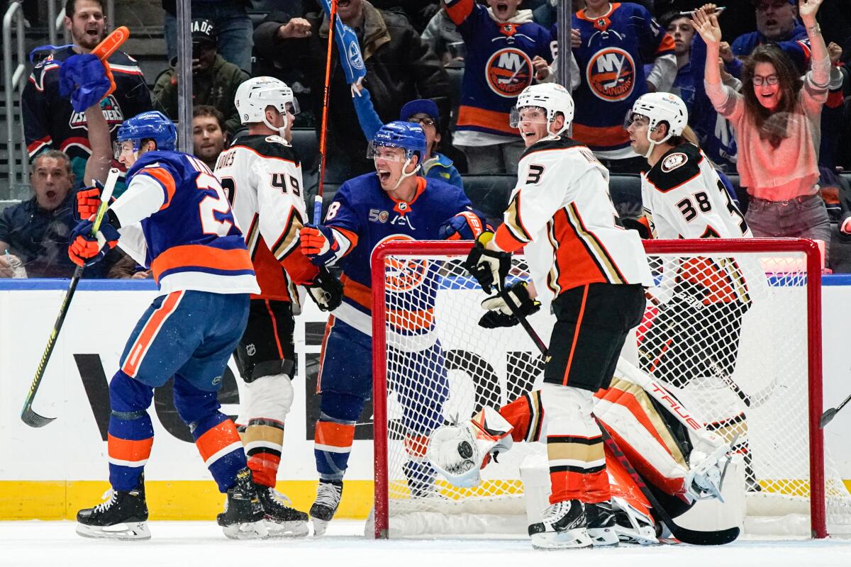 The Islanders' Anthony Beauvillier (18) celebrates after Scott Mayfield (24) scored a first-period goal Oct. 15, 2022.