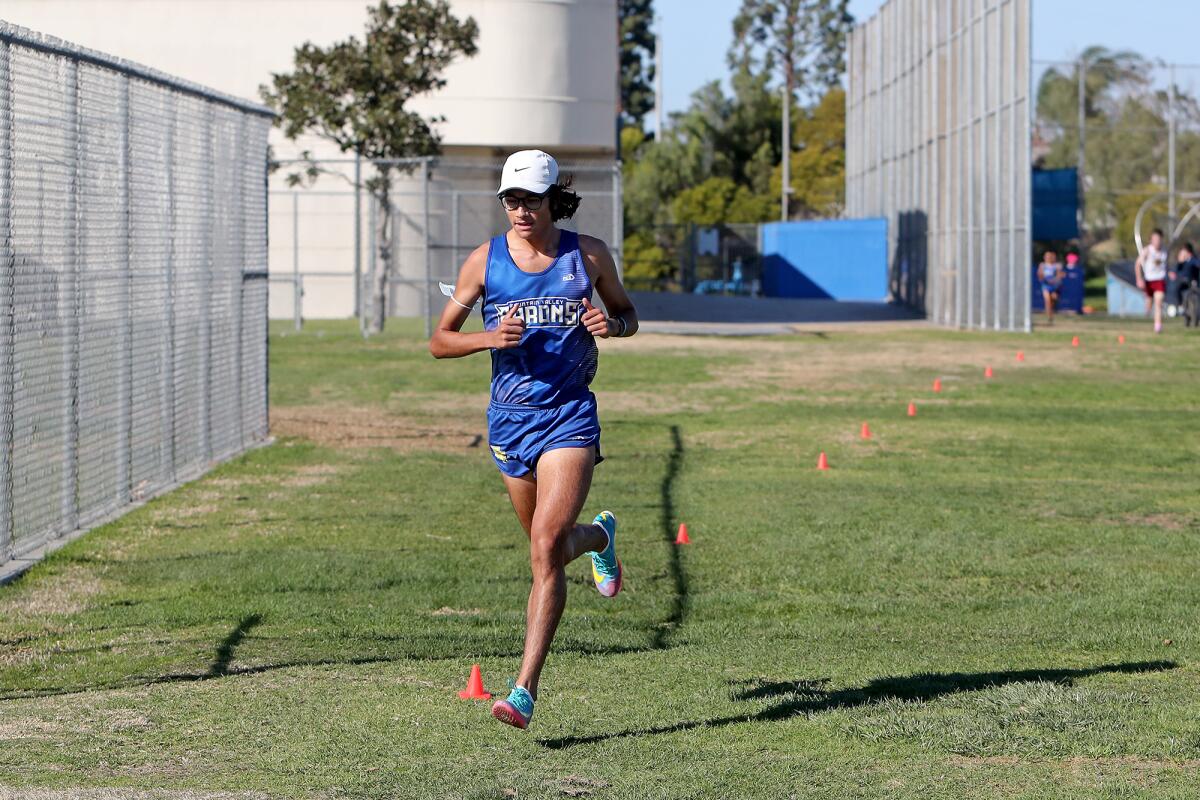 Fountain Valley's Dezi Hernandez competes against Ocean View during a cross-country dual meet on Saturday.