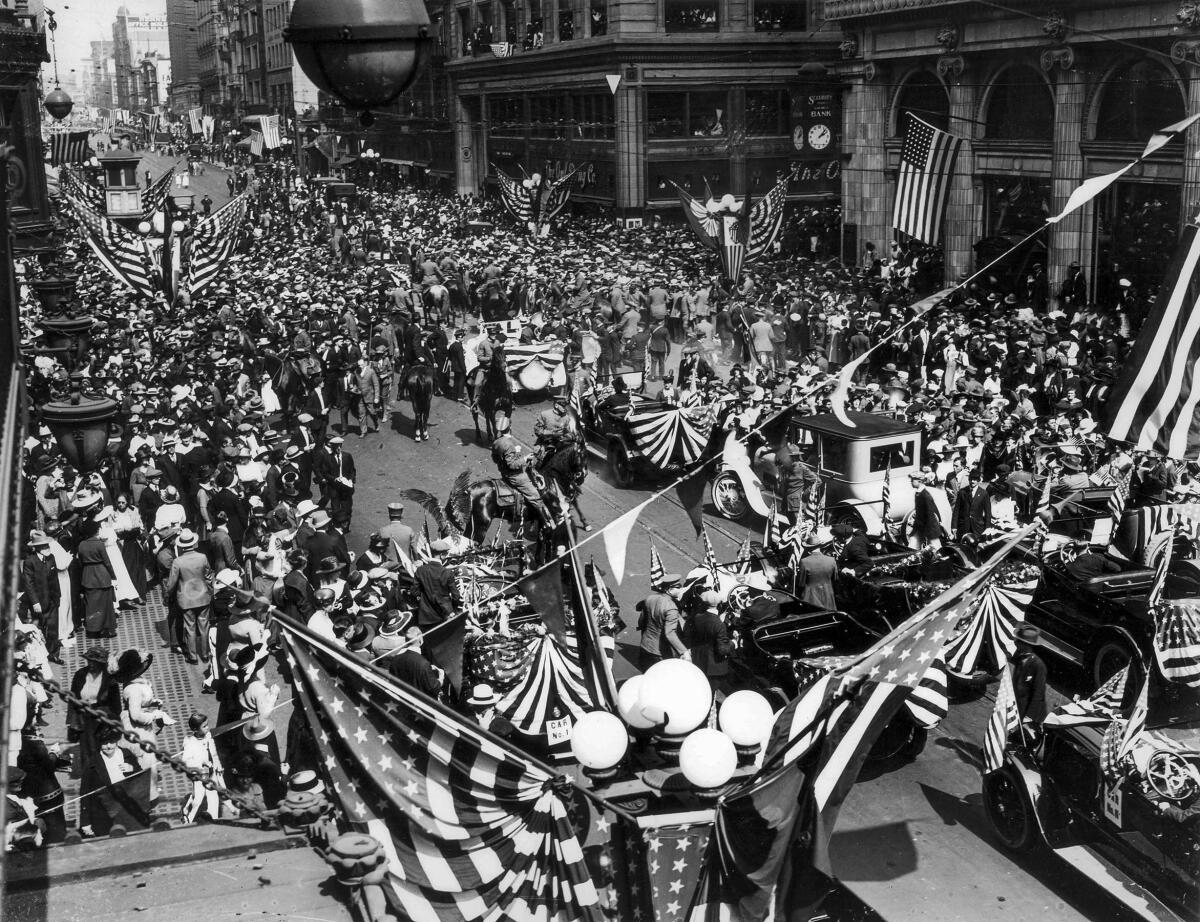 Sept. 20, 1919: Thousands of spectators gather for a parade for President Woodrow Wilson in downtown Los Angeles.