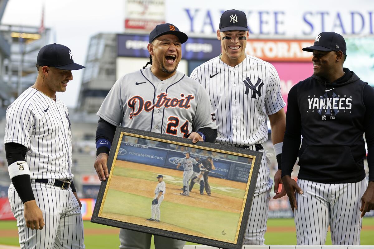Miguel Cabrera reacts with New York Yankees' Gleyber Torres, Aaron Judge and Luis Severino