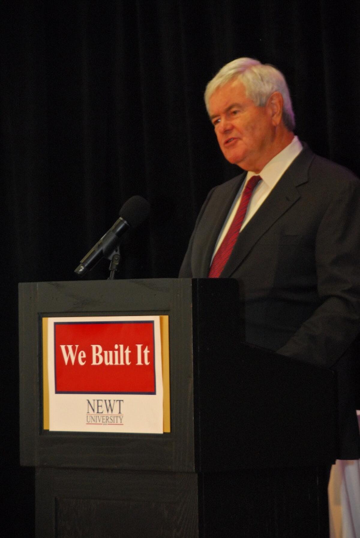 Newt Gingrich kicks off second day of "Newt U" with a jab at President Obama.