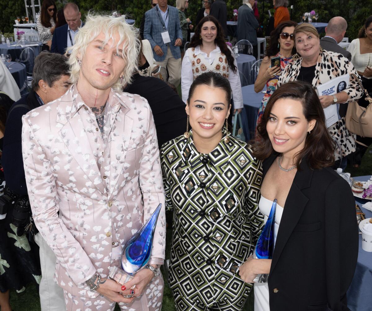 Colson Baker, from left, Amber Midthunder and Aubrey Plaza.