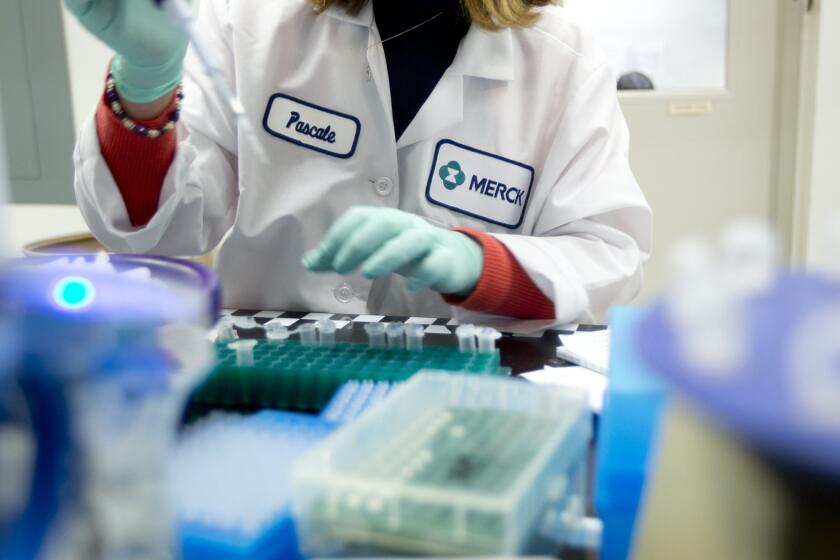 Merck & Co. scientist Pascale Nantermet conducts research at West Point, Pa., facilities. Merck said Monday it would buy Cubist Pharmaceuticals.
