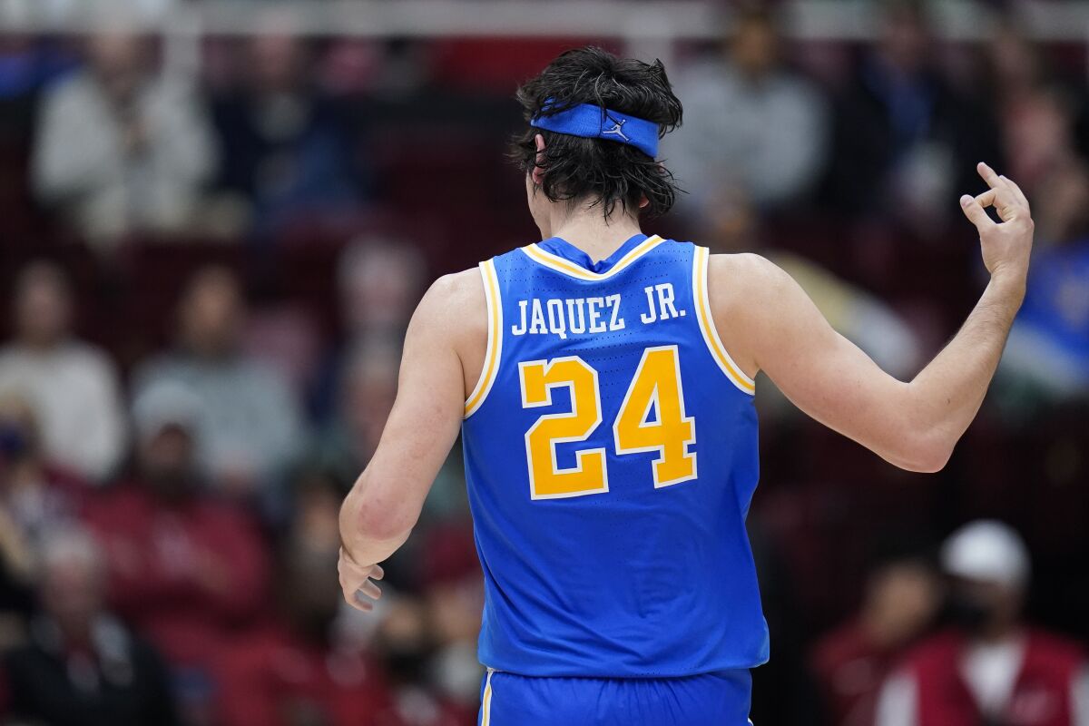 UCLA guard Jaime Jaquez Jr. reacts after scoring a 3-point basket against Stanford during the first half of an NCAA college basketball game in Stanford, Calif., Thursday, Dec. 1, 2022. (AP Photo/Godofredo A. Vásquez)
