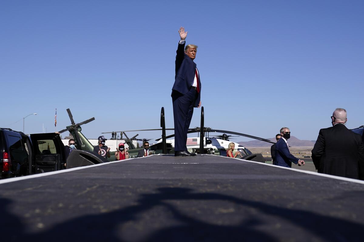 President Trump waves at Prescott Regional Airport in Prescott, Ariz.