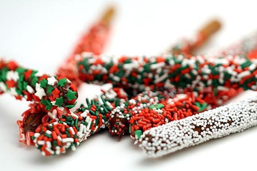 With adult supervision, kids can make chocolate-covered pretzels.