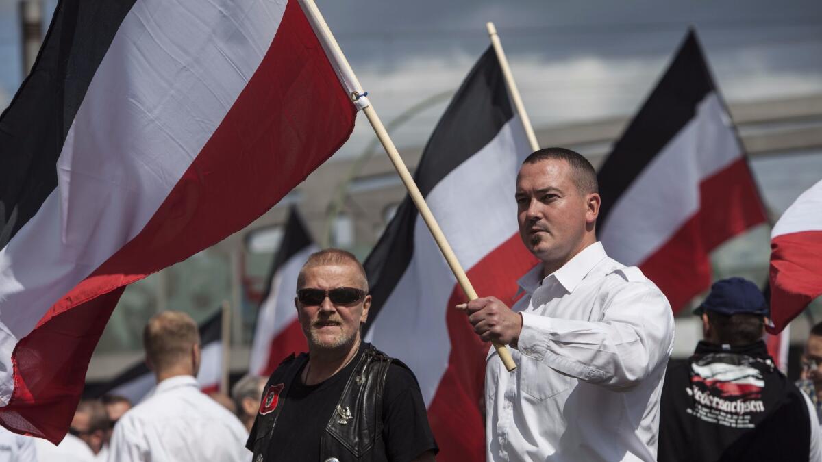 Neo-Nazi demonstrators gather in Berlin on Saturday to mark the 30th anniversary of the death of Nazi Rudolf Hess.