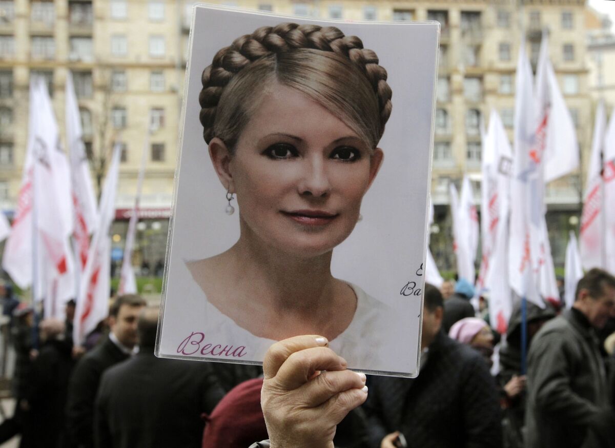 Ukrainian opposition activists demand the release of former Prime Minister Yulia Tymoshenko, imprisoned on charges of misuse of office that European Union leaders consider politically motivated. The EU has made Ukraine's ending of "selective justice" a condition for joining the 28-member bloc, but the Ukrainian parliament shot down six measures Thursday that would have allowed Tymoshenko to leave for Germany for treatment of a chronic back ailment.