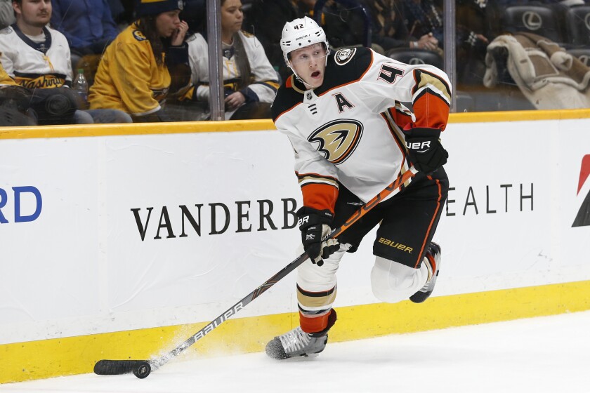 Ducks defenseman Josh Manson looks to move the puck against the Predators during the second period of a game Jan. 16 at Bridgestone Arena.