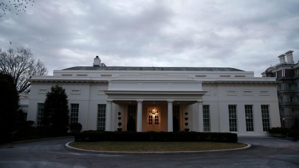 The West Wing of the White House is dark on Sunday.