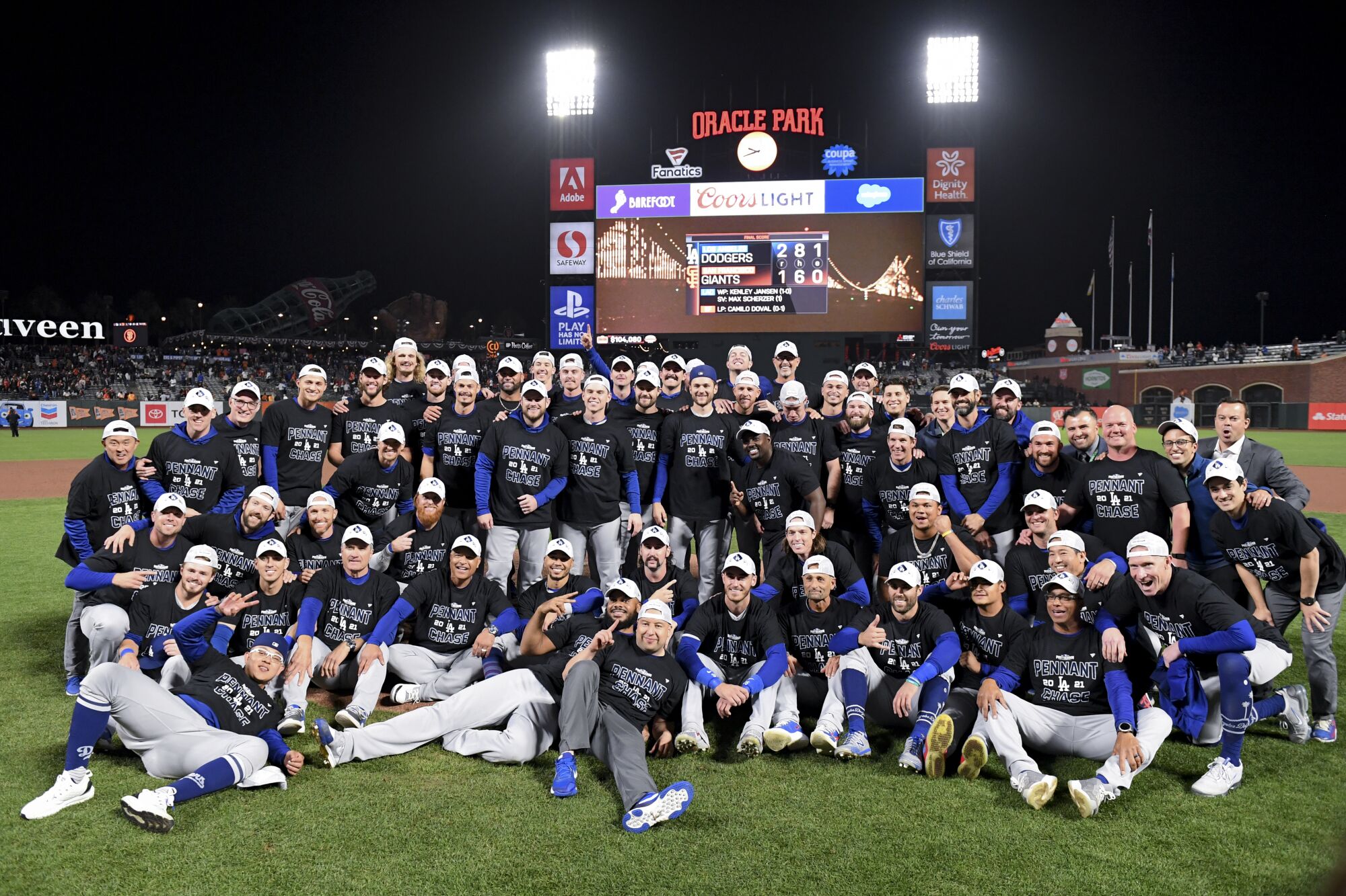 The Los Angeles Dodgers pose for a team photo after game five
