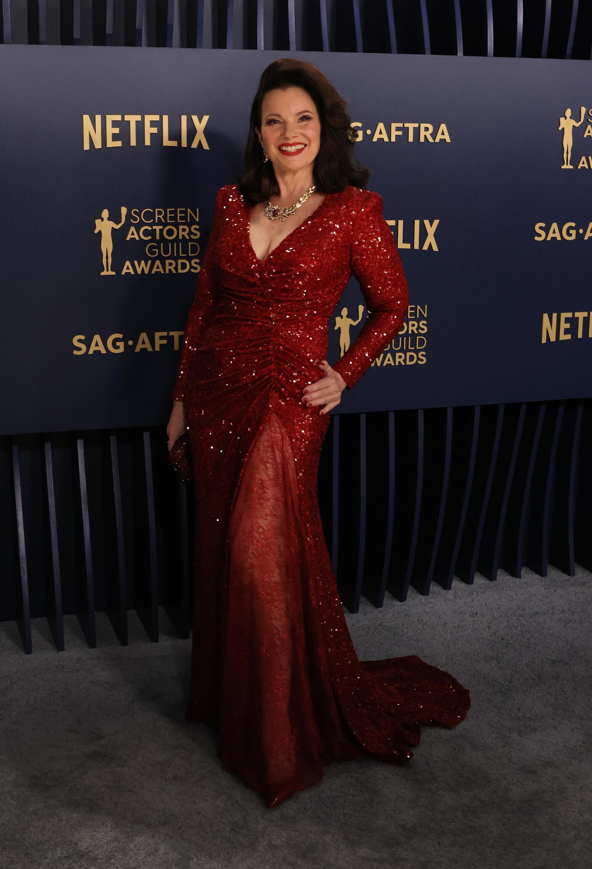 Fran Drescher wears a sequined red gown at the SAG Awards.