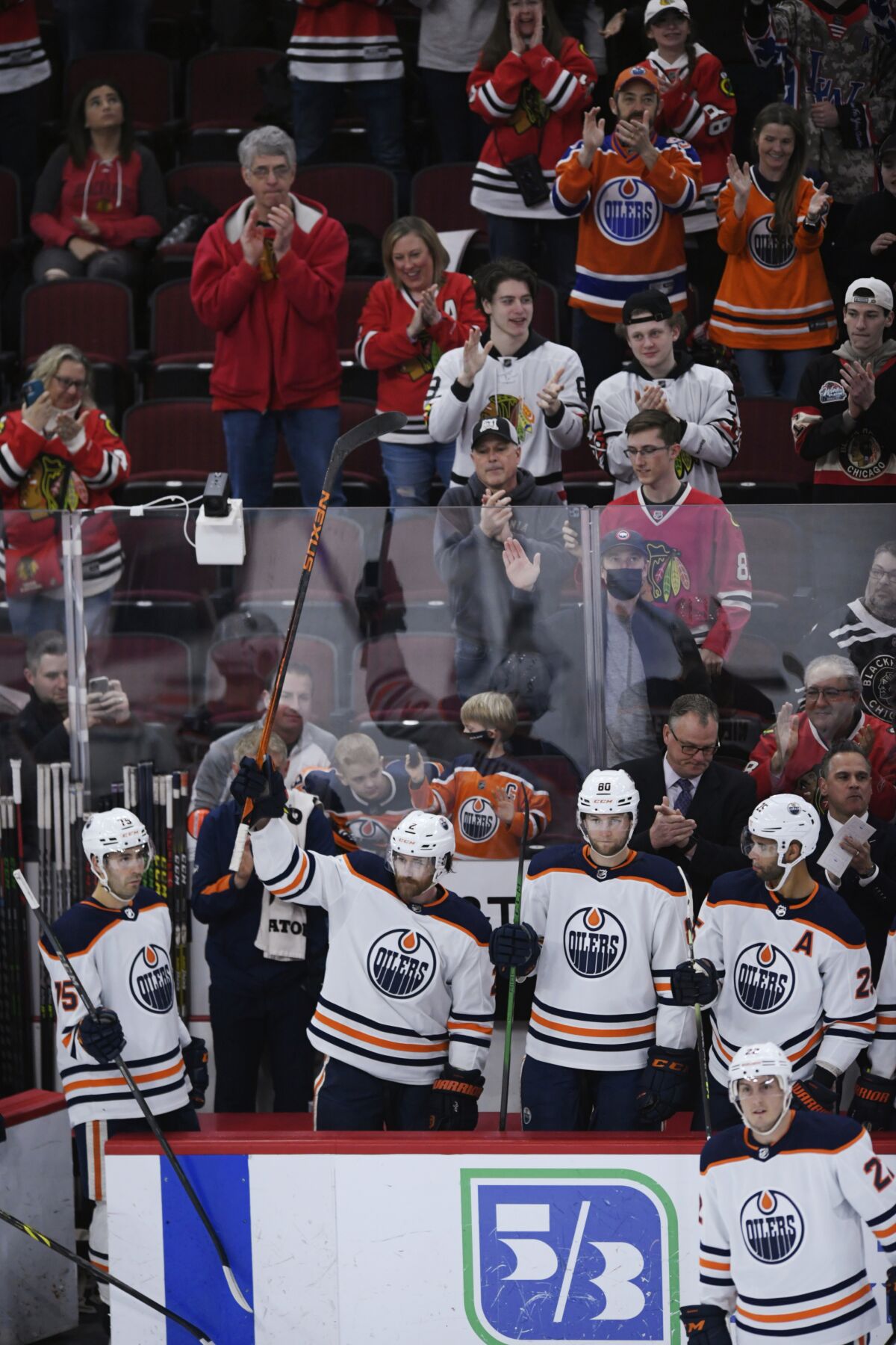 Edmonton Oilers' Duncan Keith, a former Chicago Blackhawk, is honored during an NHL hockey game between the teams Thursday, March 3, 2022, in Chicago. (AP Photo/Paul Beaty)
