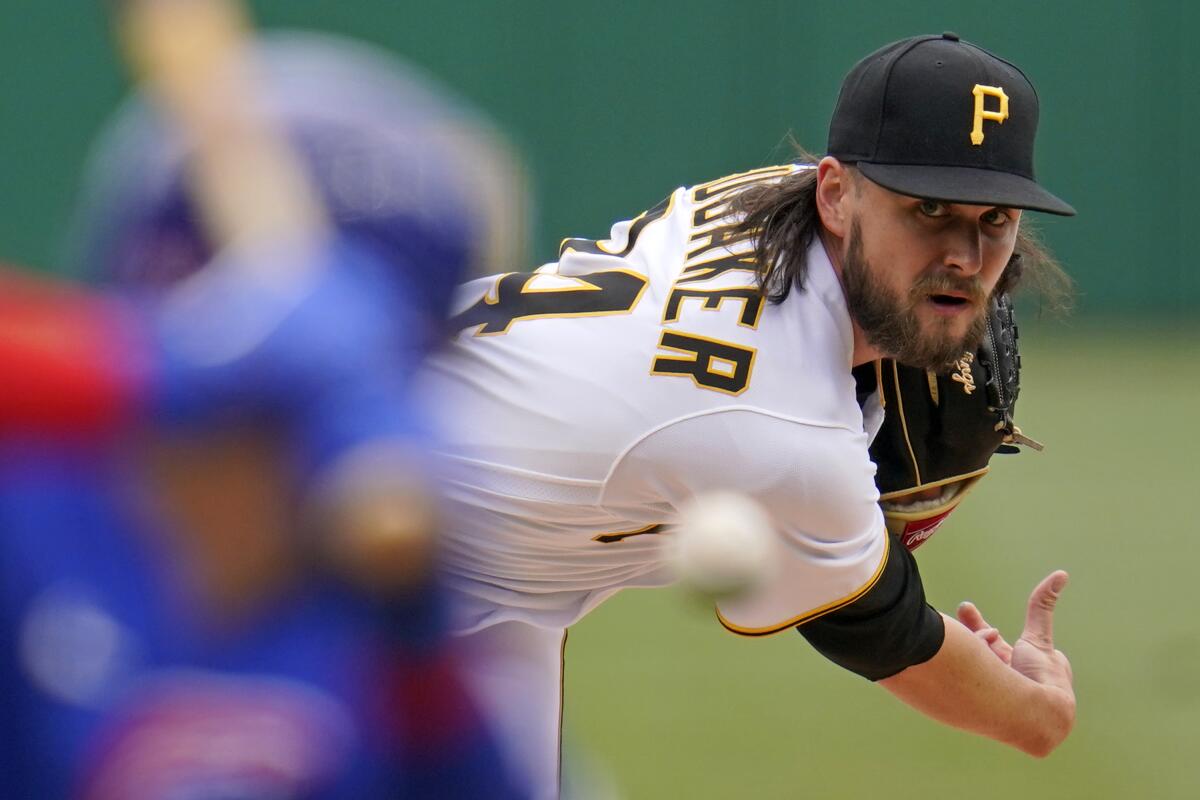 Pittsburgh Pirates starting pitcher JT Brubaker delivers during the first inning of a baseball game against the Chicago Cubs in Pittsburgh, Sunday, April 11, 2021. (AP Photo/Gene J. Puskar)