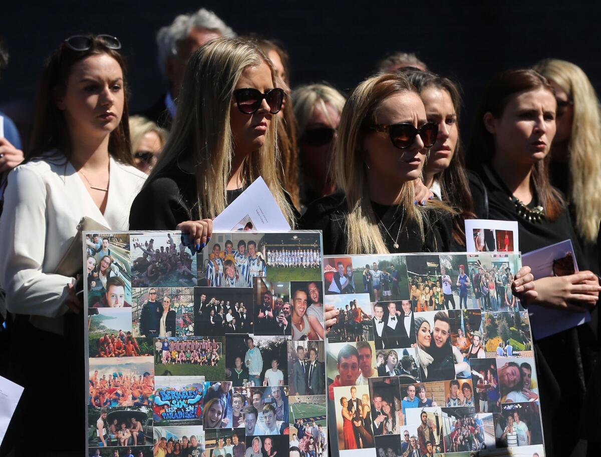 Mourners attend the funeral of Eoghan Culligan at the Church of the Annunciation on Tuesday in Dublin, Ireland. He was one of six students killed in last week's balcony collapse in Berkeley.