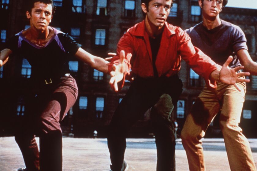 98–02–15 –– PLAYING ITCOOL: Robert Wise's production of "West Side Story" won him two 1961 Oscars. –– PHOTOGRAPHER: MGM/UA Entertainment A scene fromthe film"West Side Story." Credit: MGM/UA Entertainment 1961