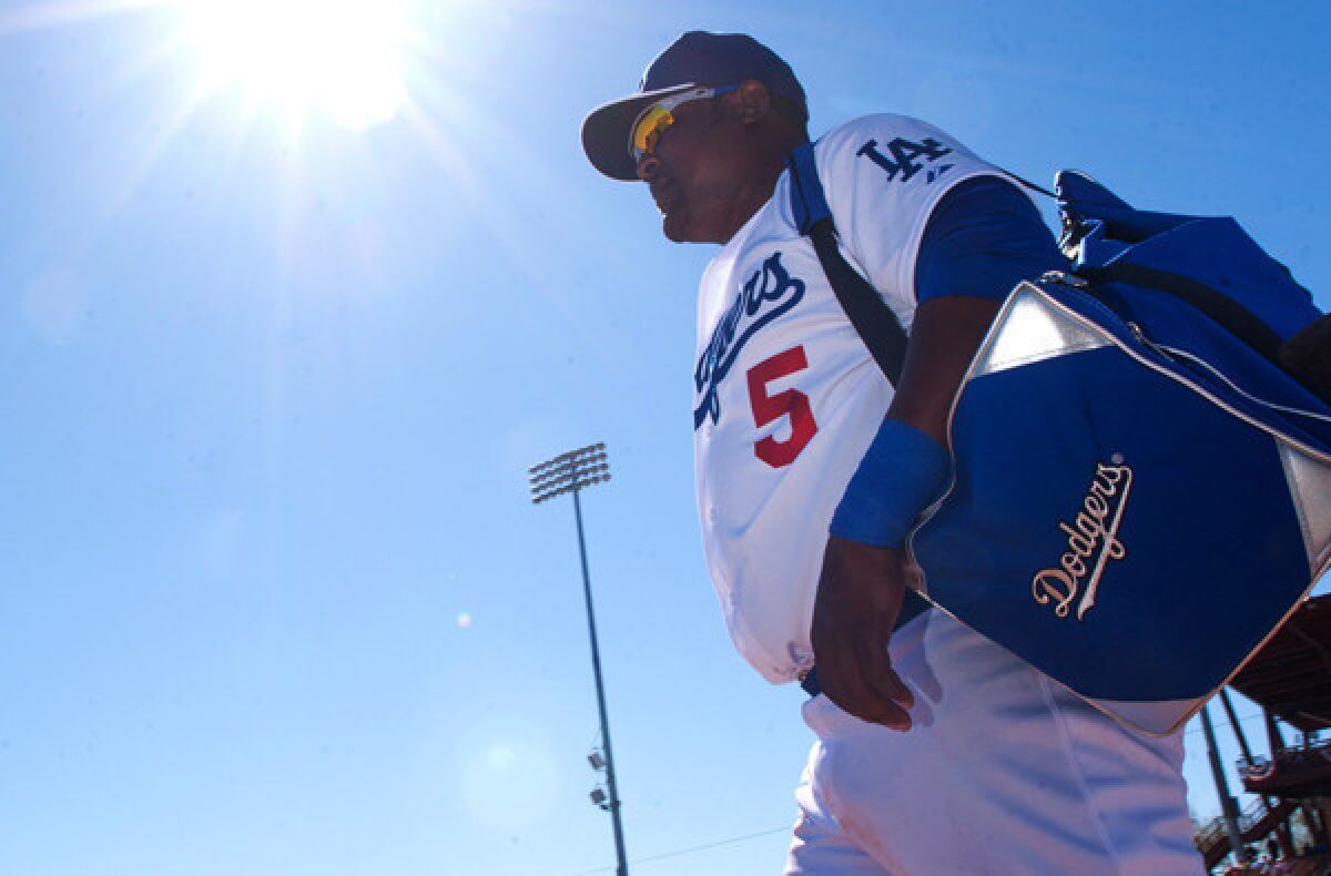 Dodgers infielder Juan Uribe arrives at Camelback Ranch for a spring workout last month.