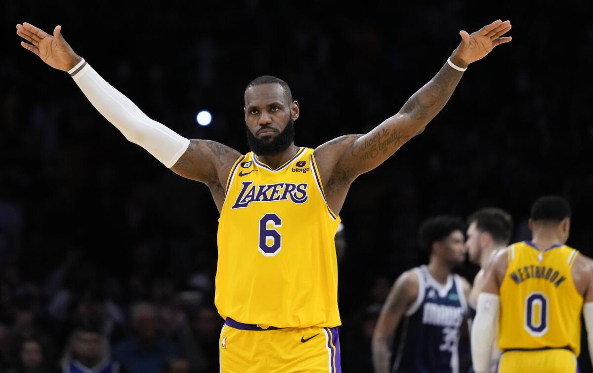 Lakers' LeBron James (6) gestures during the second half of the team's NBA basketball game against the Dallas Mavericks