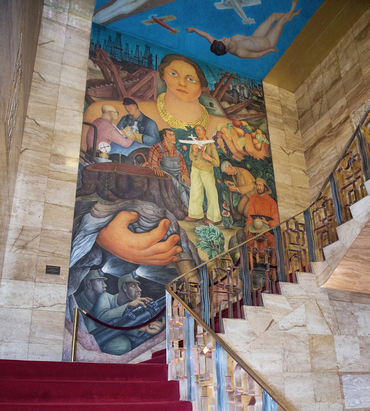 A large mural depicting a female figure