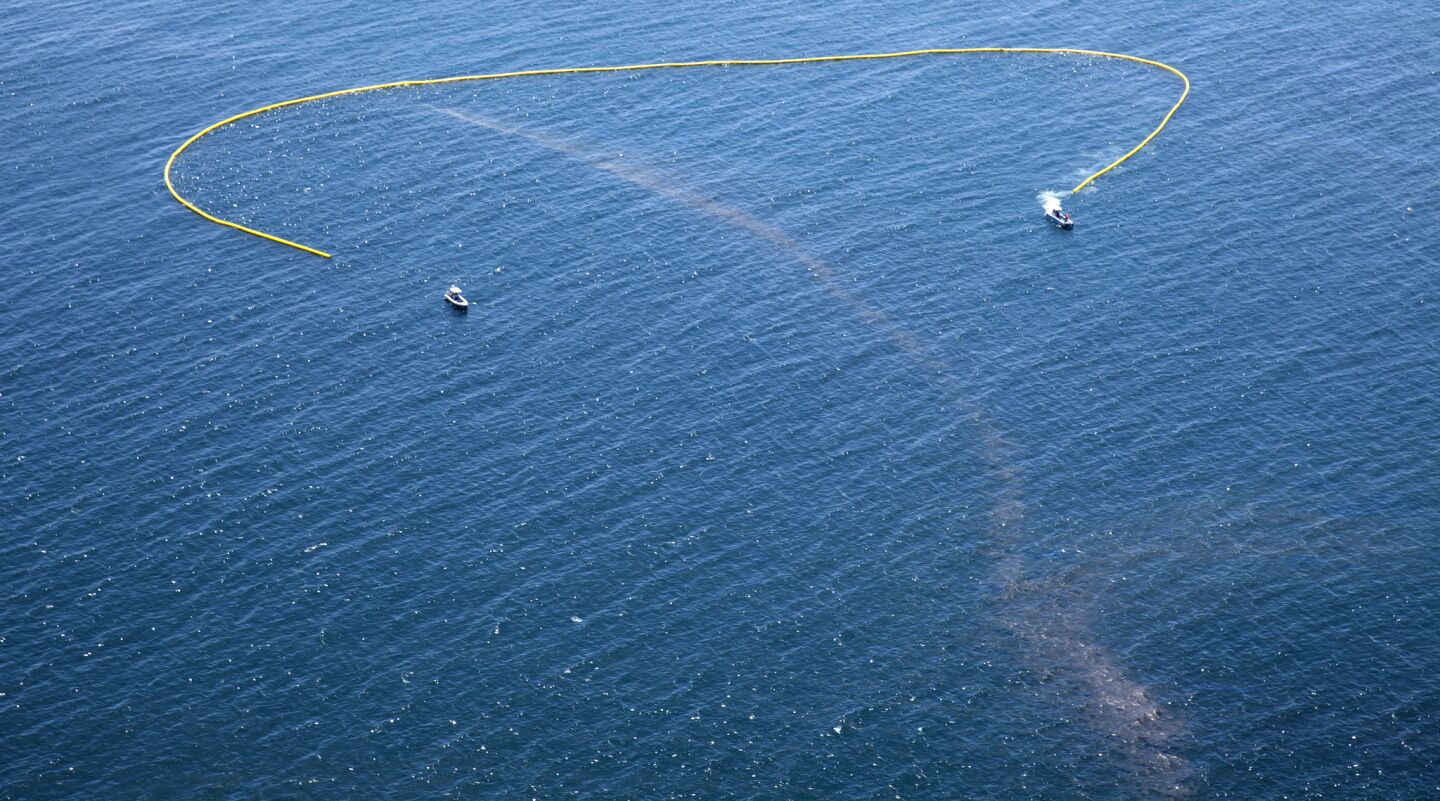 An oil boom is deployed offshore as the cleanup and containment effort continues along in Santa Barbara County.