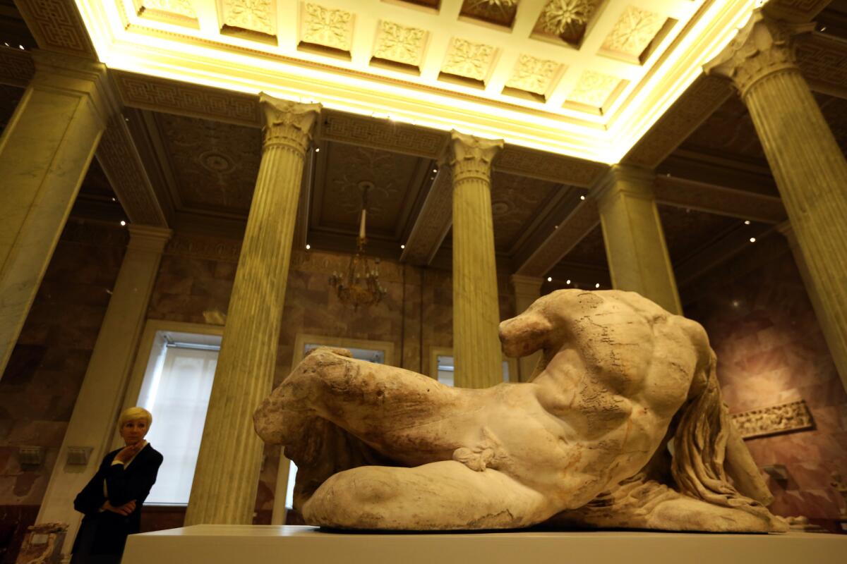 Greece says it will seek the return of the Parthenon Sculptures from England via diplomatic channels. Last year, one of the sculptures (of the river god Ilissos) in the British Museum's collection traveled to the State Hermitage Museum in Russia, above.