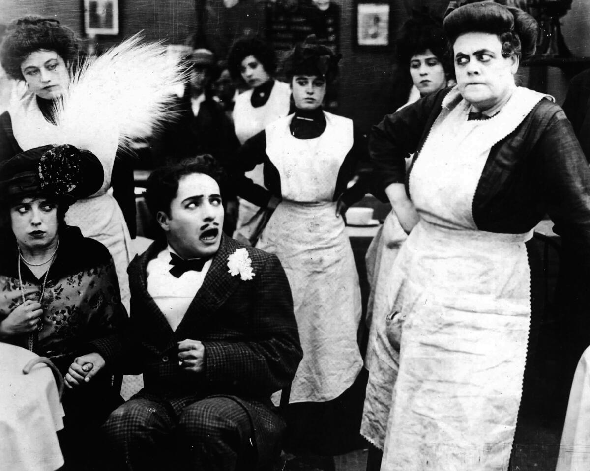 Mabel Normand as Mabel, Charlie Chaplin as Charlie, and Marie Dressler as Tillie Banks in "Tillie's Punctured Romance."