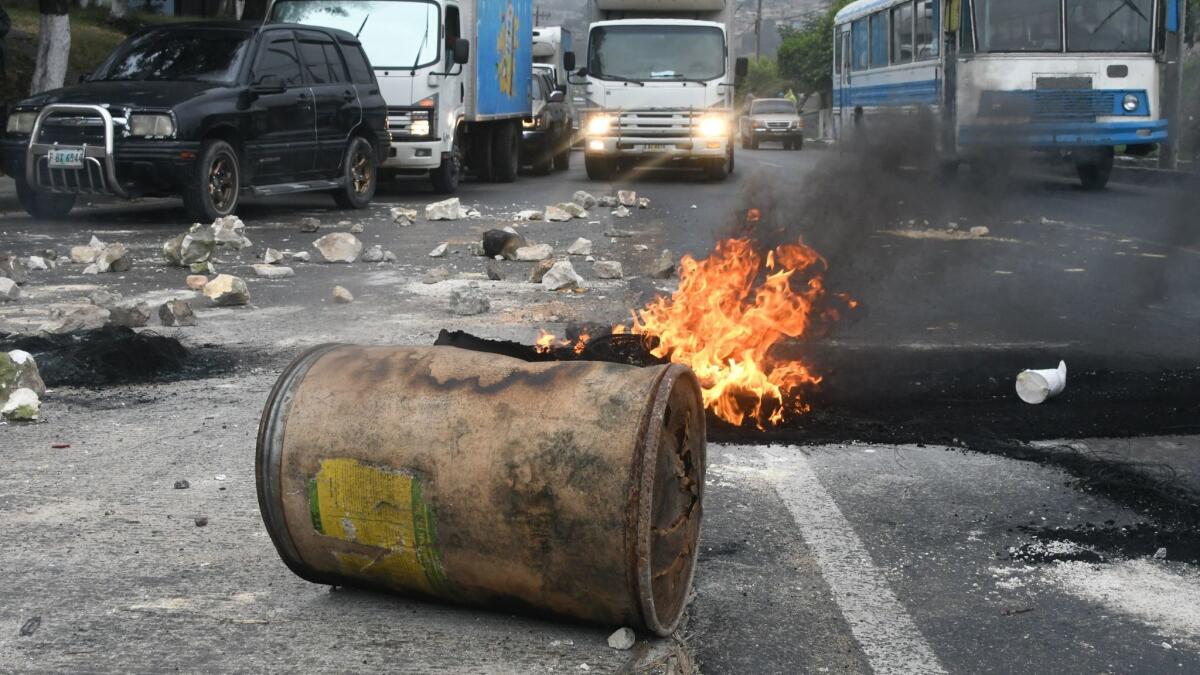 Protests erupted in Tegucigalpa on Monday after Honduran President Juan Orlando Hernandez was declared the winner of a heavily disputed election.