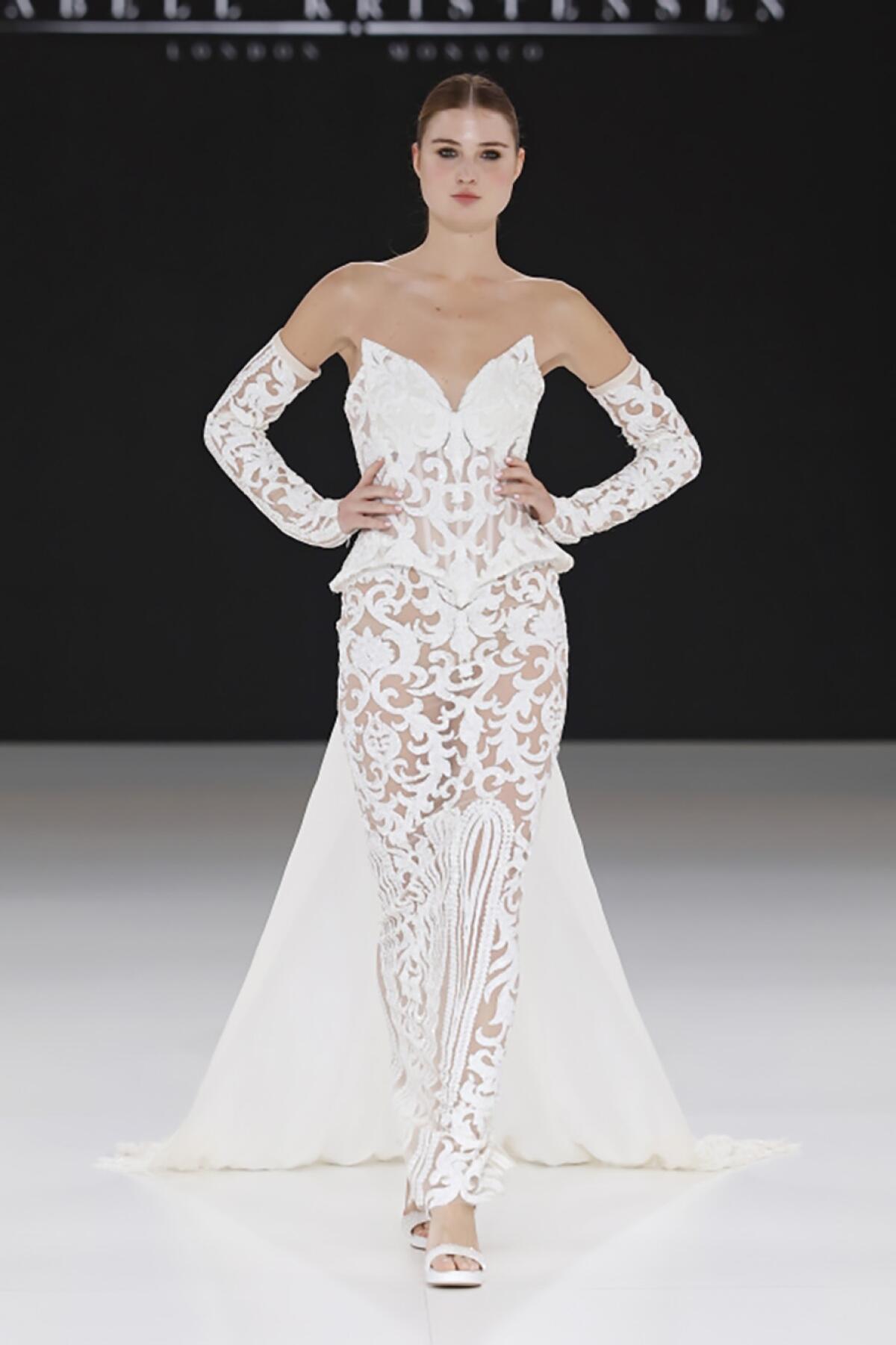A model walks the runway at the Isabell Kristensen show for Bridal Fashion Week.