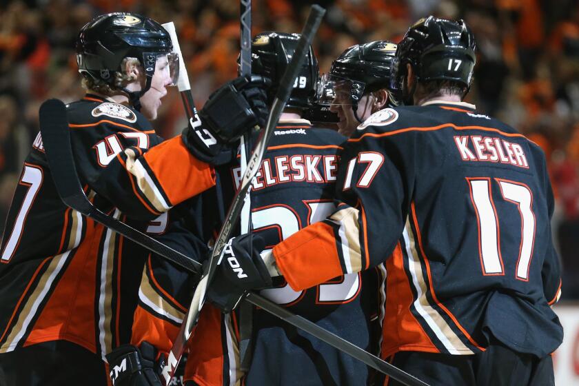 The Ducks celebrate a first-period goal by defenseman Hampus Lindholm during Game 1 of the Western Conference finals against the Chicago Blackhawks at Honda Center on Sunday.