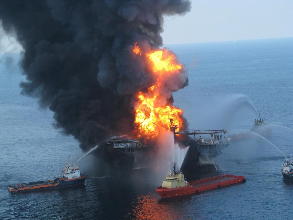 A U.S. Coast Guard image shows fire boats spraying the blazing remnants of the Deepwater Horizon rig.