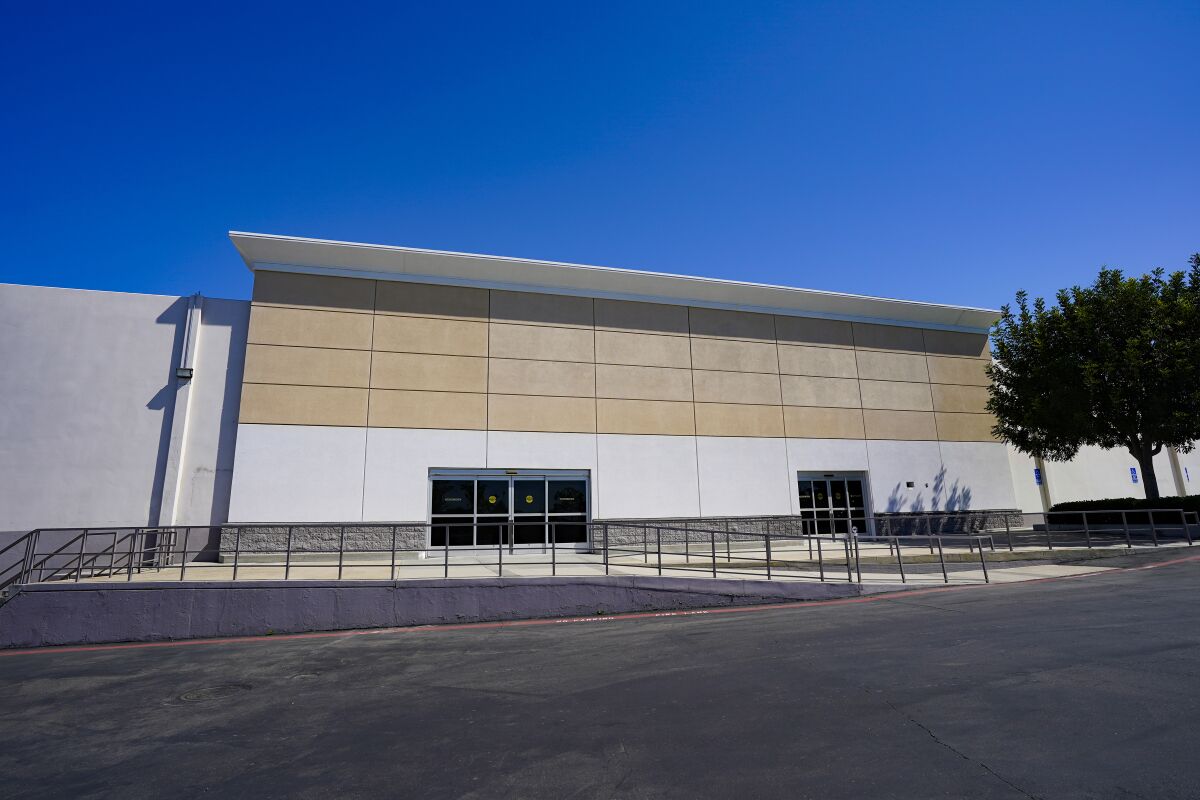 A large retail storefront on Grossmont Boulevard sits vacant in La Mesa.
