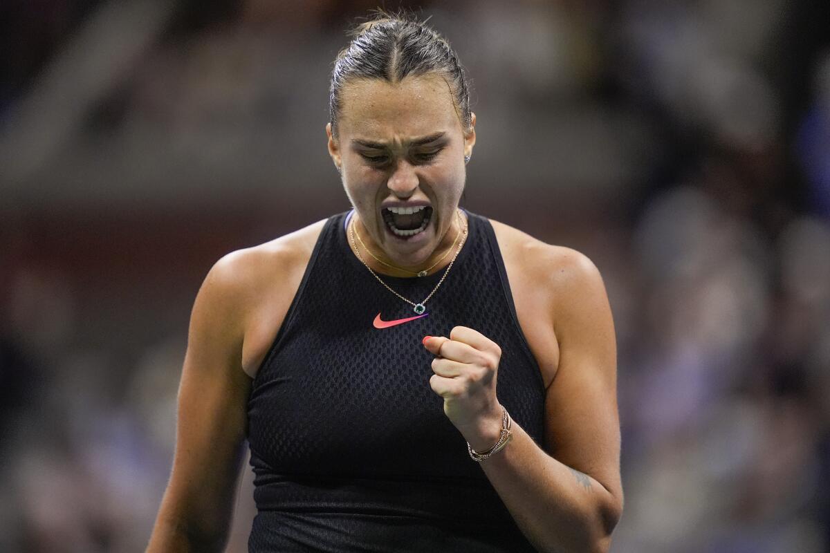 Aryna Sabalenka, of Belarus, reacts after scoring a point against Emma Navarro, of the United States.