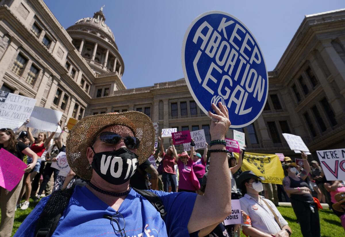 Abortion rights demonstrators attend a rally at the Texas state Capitol in Austin.