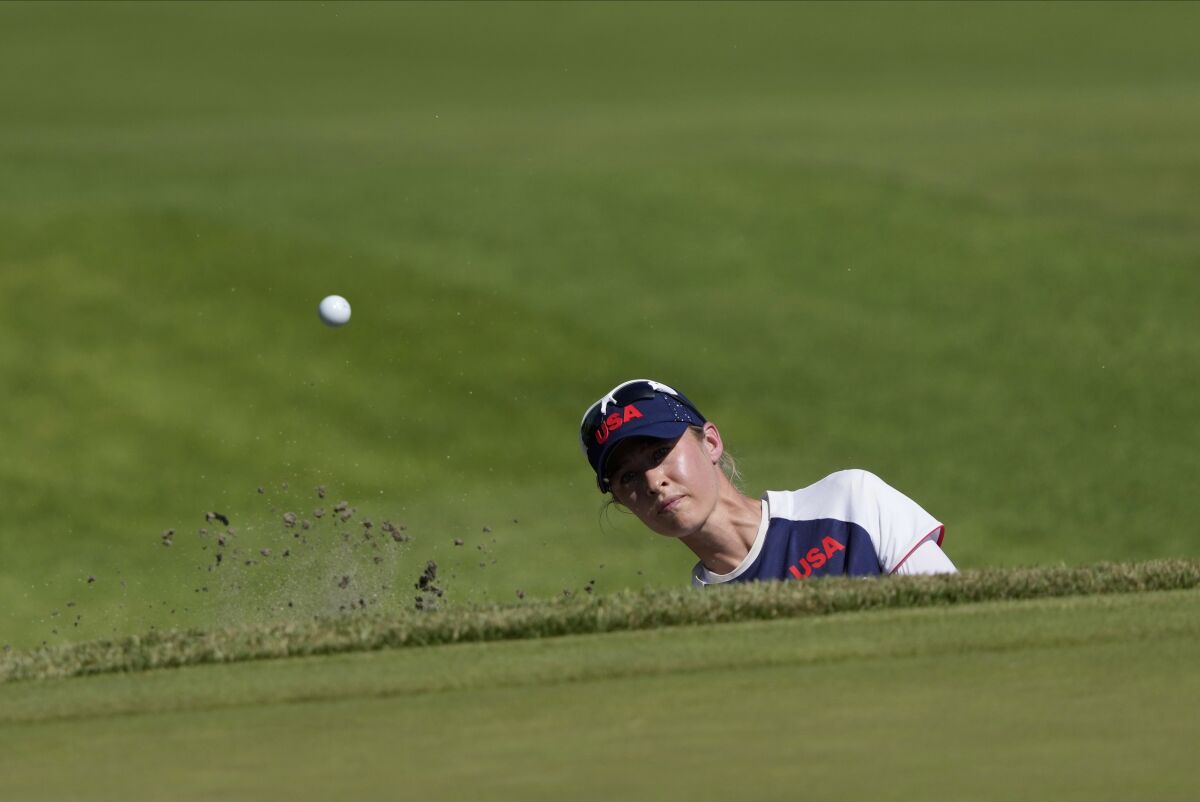 Nelly Korda, of the United States, plays a shot from a bunker on the 18th hole during the second round of the women's golf event at the 2020 Summer Olympics, Thursday, Aug. 5, 2021, at the Kasumigaseki Country Club in Kawagoe, Japan. (AP Photo/Andy Wong)