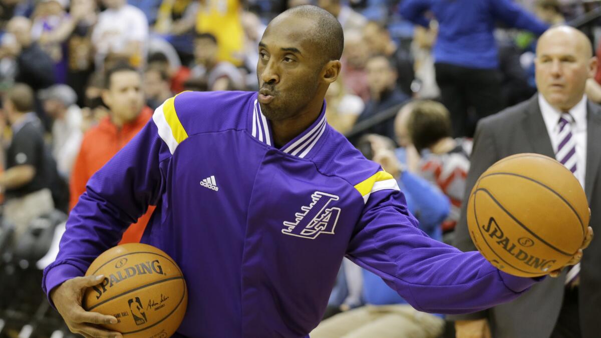 Lakers guard Kobe Bryant warms up before a game against the Minnesota Timberwolves on Dec. 14.