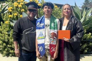 Undated handout photo of Ricardo "Ricky" Ramirez, Jr., center, flanked by his parents. The family of Ramirez Jr., announced a lawsuit in connection with the teen's shooting death.