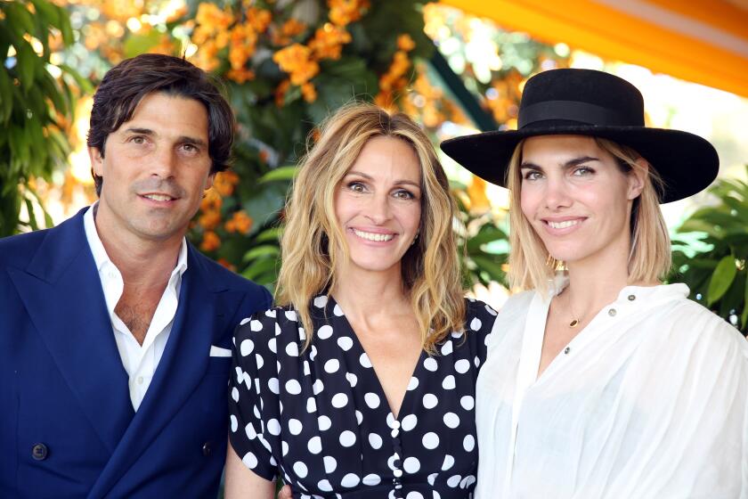 LOS ANGELES, CA-OCTOBER 5, 2019: Nacho Figueras, Julia Roberts and Delfina Blaquier, left to right, stand for a portrait during the 10th anniversary of the Veuve Clicquot Polo Classic at Will Rogers Park on October 5, 2019 in Los Angeles, California. (Photo By Dania Maxwell / Los Angeles Times)