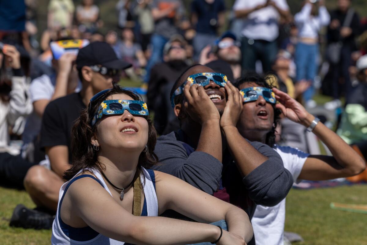 Solar eclipse watchers at Griffith Observatory.