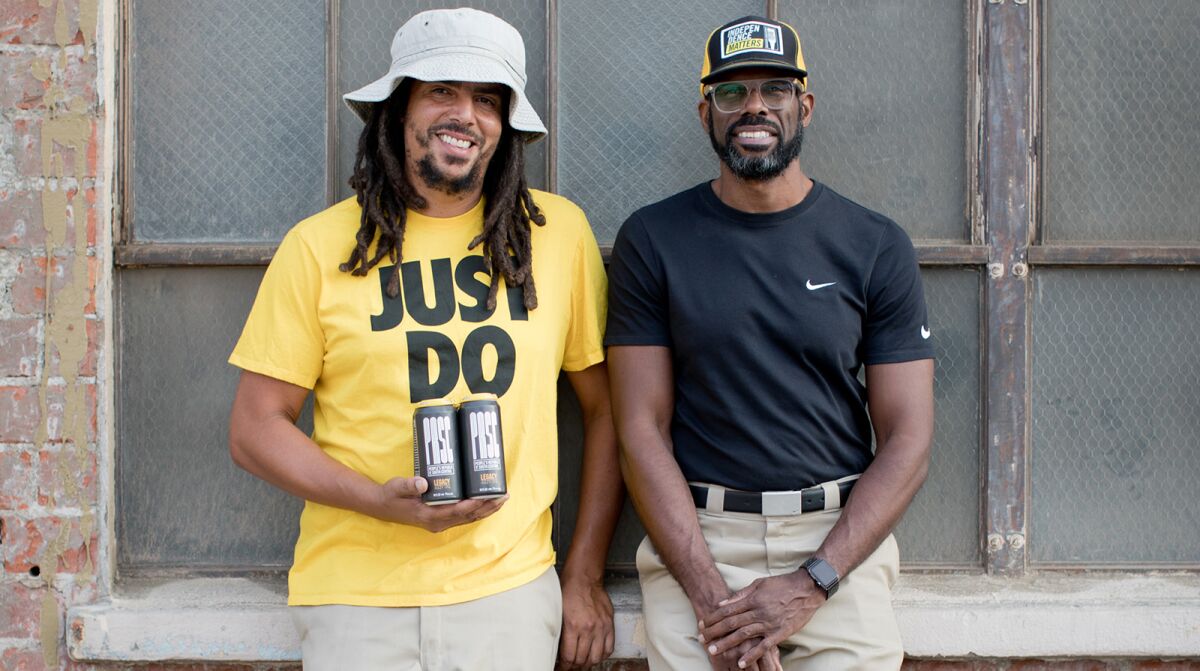 From left, Samuel Chawinga and Craig Bowers, owners of South Los Angeles Beverage Compay.