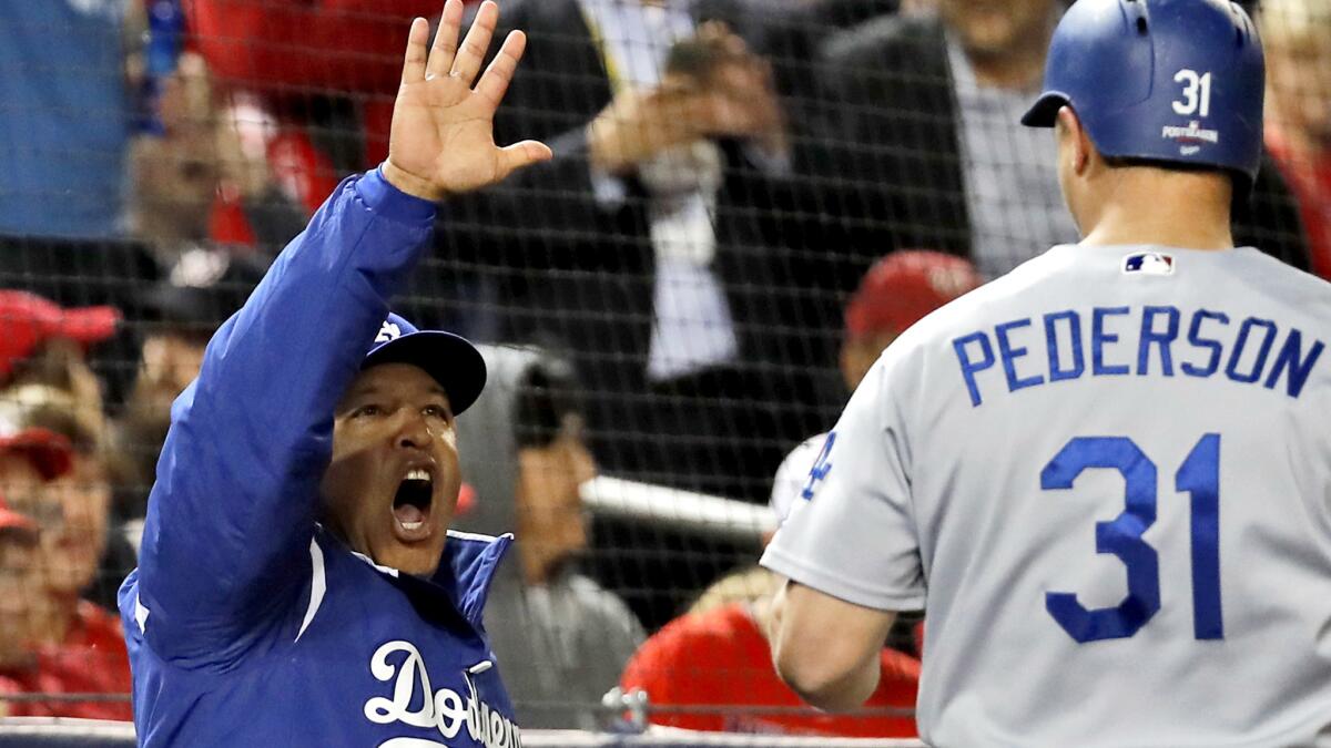 Los Angeles Dodgers Clayton Kershaw leaves the dugout to the locker room in  the eighth inning after being taken out of the game against the Washington  Nationals at Nationals Stadium in Washington