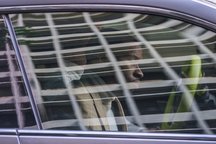 Daystar Peterson, the Canadian rapper known as Tory Lanez, is driven away from the Clara Shortridge Foltz Criminal Justice Center, in Los Angeles, Tuesday, Dec. 13, 2022. Lanez is free on bail after being charged with felony assault for allegedly shooting rapper Megan Thee Stallion at her feet. (AP Photo/Damian Dovarganes)