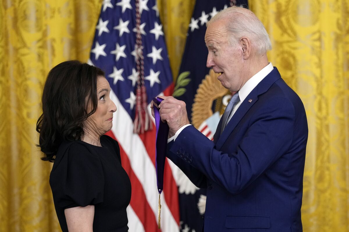 President Joe Biden presents the 2021 National Medal of the Arts to Julia Louis-Dreyfus at White House in Washington, Tuesday, March 21, 2023. (AP Photo/Susan Walsh)