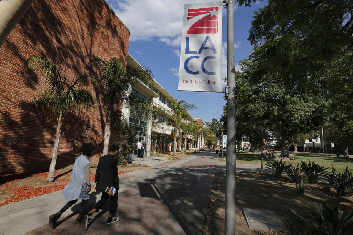 Students walk between classes at Los Angeles City College in Los Angeles.