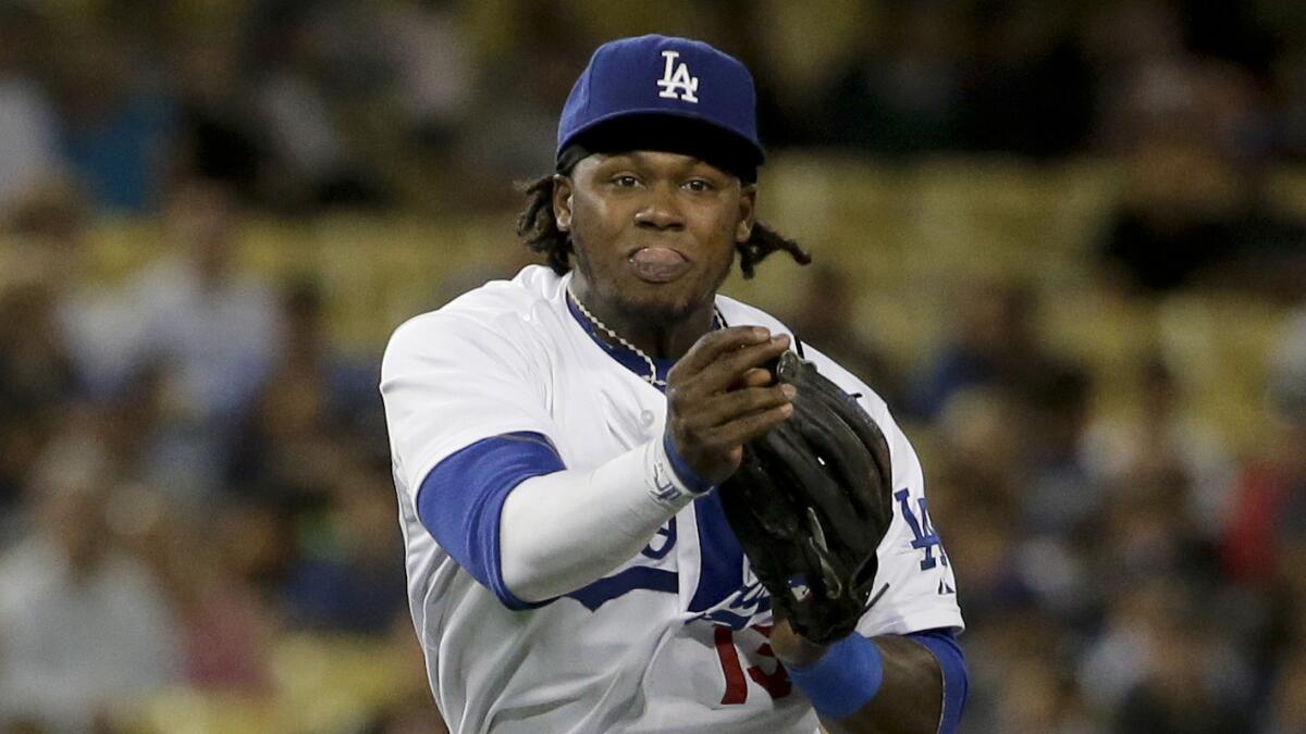 Dodgers shortstop Hanley Ramirez makes a throw during a game against the Colorado Rockies on June 18. Ramirez returned to the starting lineup Saturday against the St. Louis Cardinals.