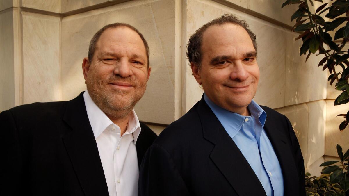 The Weinstein Co. board erupted in turmoil Friday over what to do with brothers Harvey, left, and Bob Weinstein's studio.