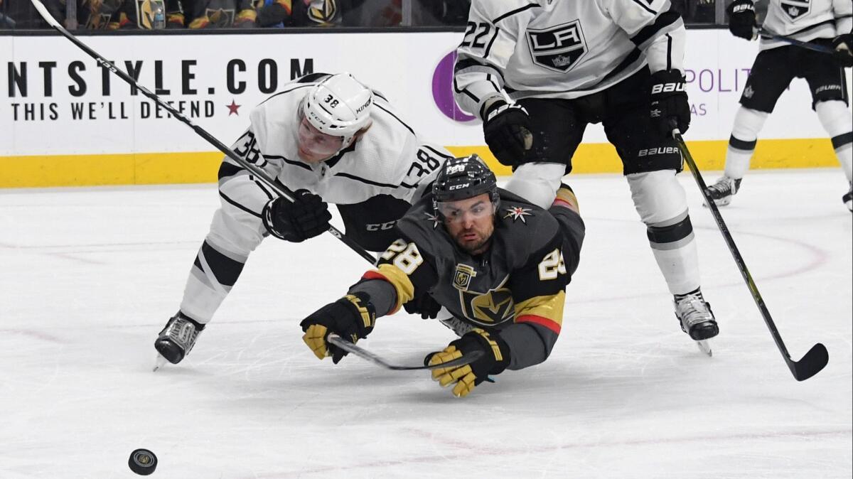 Defenseman Paul LaDue, left, scored the Kings' lone goal in a Game 2 loss of their playoff series against Vegas last season.